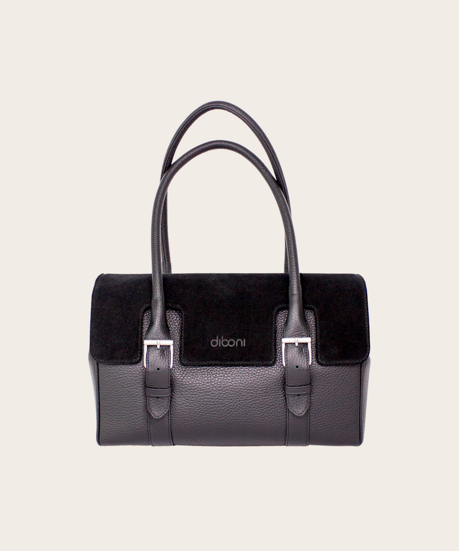 Handtasche Charlotte Couture von diboni in schwarz wird aus italienischem Leder in Handarbeit in einer deutschen Manufaktur hergestellt.