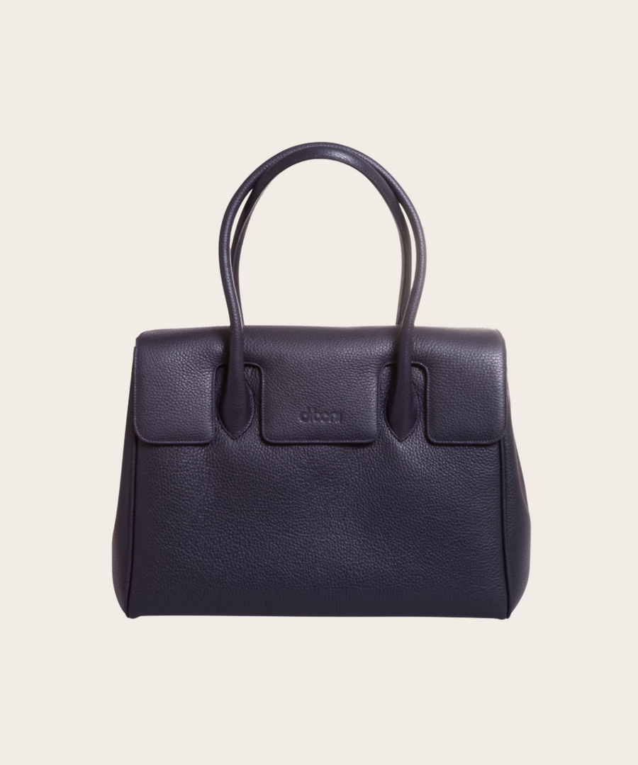 Handtasche und Schultertasche Madison Couture von diboni in dunkelblau wird aus italienischem Leder in Handarbeit in einer deutschen Manufaktur hergestellt.